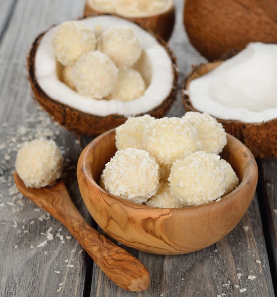 Coconut snowball snacks in wooden bowl